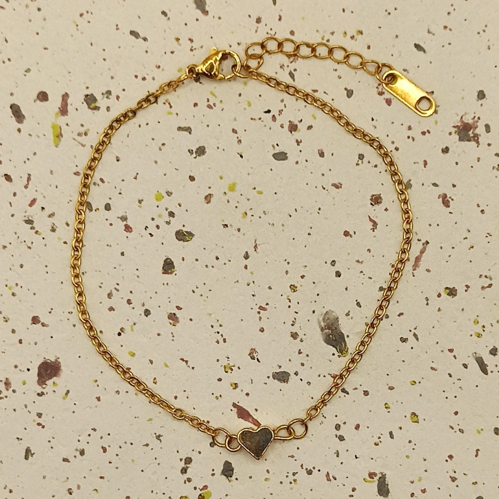 Fijn armbandje met gouden hart