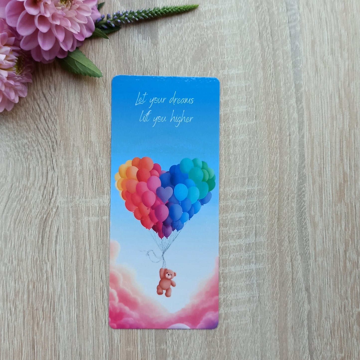 Bladwijzer met quote: "Let your dreams lift you higher"