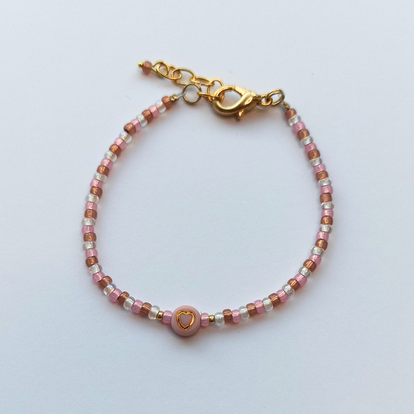 Sweatheart fijne armband met rocailles licht roze wit goud